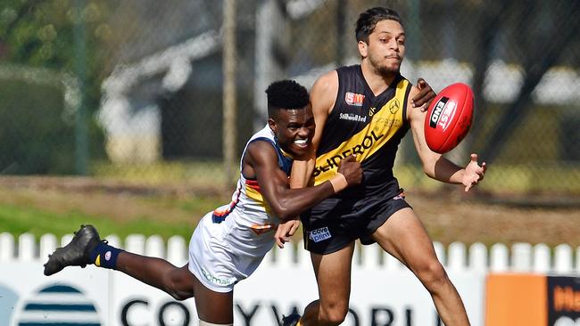 18/08/18 - SANFL: Glenelg v Adelaide at Glenelg Oval.  Adelaide's Aron Asfaha tackles Glenelg's Ian Milera.Picture: Tom Huntley