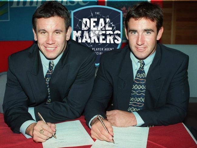 Newcastle icons Matthew (L) and Andrew Johns (R) signing contracts.