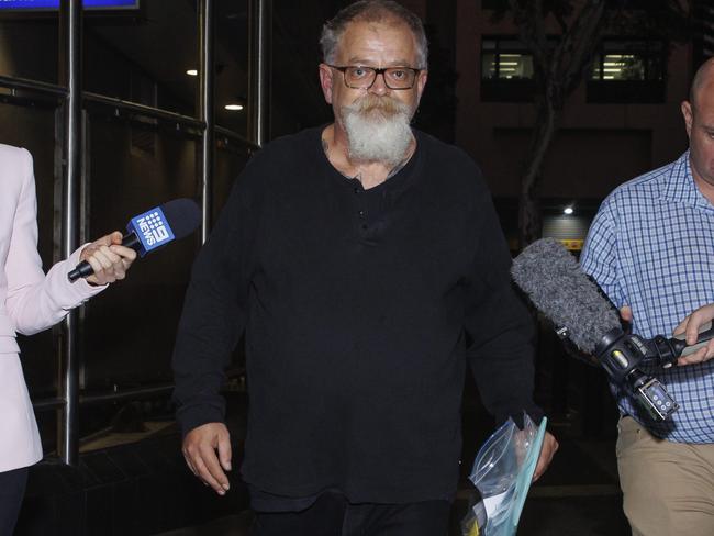 High profile lawyer Michael Bosscher leaves the Brisbane watch-house on Tuesday night. Picture: Lachie Millard