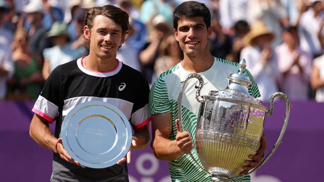 Queen’s Club runner-up Alex de Minaur and winner Carlos Alcaraz pose with their trophies. Picture: Getty Images