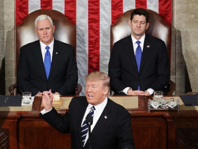 Donald Trump addresses Congress as Vice President Mike Pence (left) and House Speaker Rep. Paul Ryan look on. Picture: Chip Somodevilla/Getty Images/AFP