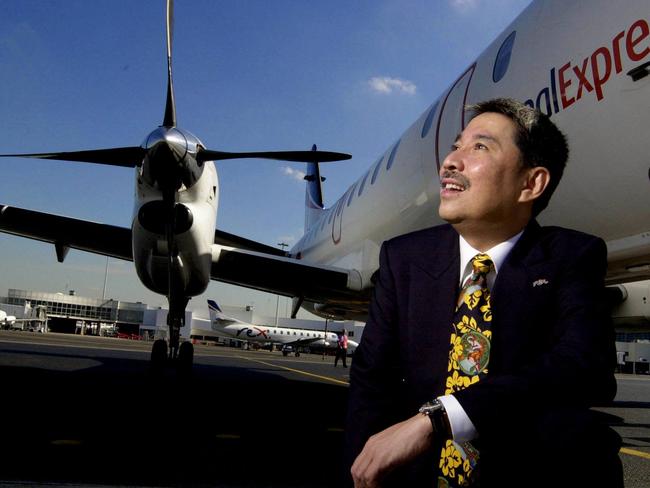 Regional Express (REX) Airline executive chairman Lim Kim Hai with one of their aircraft while checking out the running of the airline at Sydney Airport in Sydney.