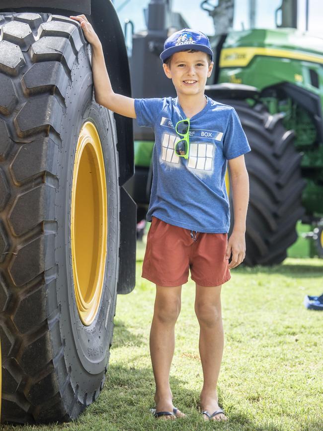 Henry Briese 8yo checks out the tractors. Toowoomba Royal Show. Friday, March 31, 2023. Picture: Nev Madsen.