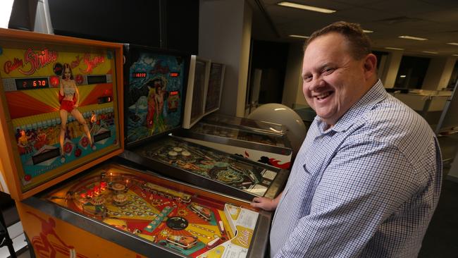 Bevan Slattery with his cherished pinball machines in his office. Picture: Lyndon Mechielsen/The Australian