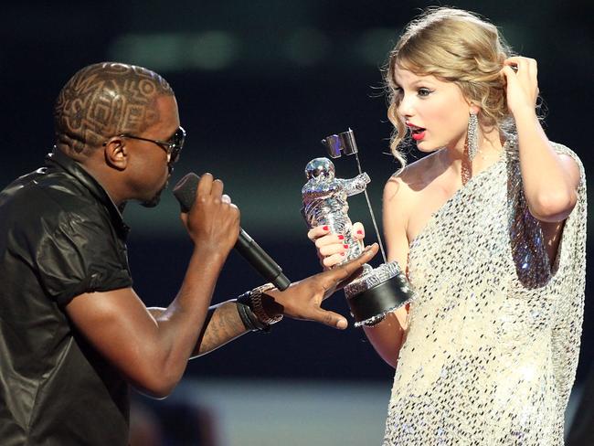 Where it all started ... Kayne West (L) jumps onstage after Taylor Swift (C) won the 'Best Female Video' award during the 2009 MTV Video Music Awards.  Picture:  Supplied