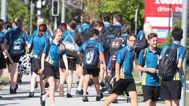 Albany Creek students after the school was evacuated following a bomb threat. Picture: Annette Dew