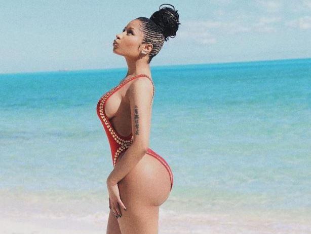 Nicki Minaj celebrates her 34th birthday on a beach on the islands of Turks and Caicos as all women do in killer heels. Picture: Mill Meek