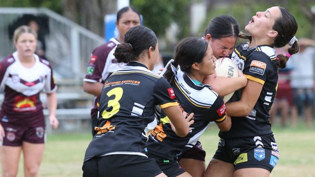 pre-season trial game between the Burleigh Bears and Tweed Seagulls at Piggabeen Oval. under-19s girls Burleigh Player No11Grace King Tweed Player No3 Charlize Ratu Pic Mike Batterham