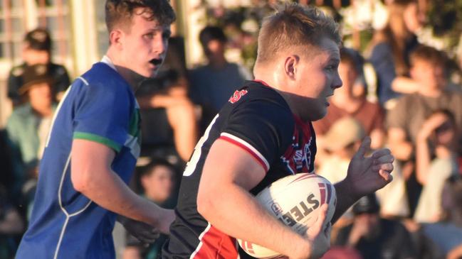 Emmaus College back rower Josh Nilon on the charge.