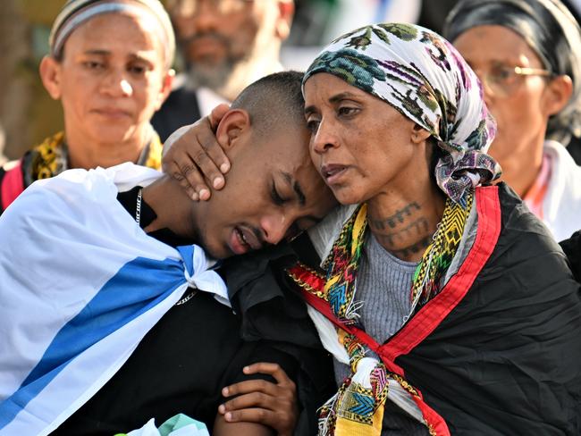 Mourners grieve for Staff Sergeant Aschalwu Sama, 20 years old, during his funeral at the Segula Cemetery in Petah Tikva, Israel. Sgt. Sama died after being wounded on November 14 while fighting in northern Gaza. Picture: Getty Images