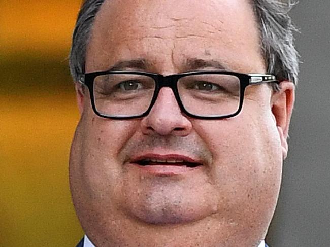 Clive Mensink, the nephew of Clive Palmer, leaves the Supreme Court in Brisbane, Wednesday, April 20, 2016. Mr Mensink Mr Mensink has asked the court to issue an injunction preventing the Queensland Nickel administrators from appointing receivers to three other Palmer nickel companies who were in a joint venture with QN. (AAP Image/Dave Hunt) NO ARCHIVING