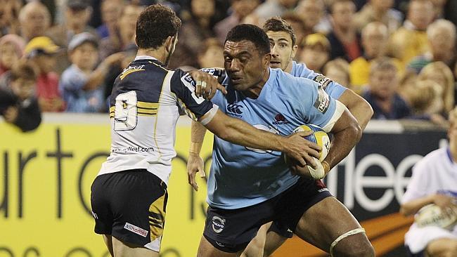 CANBERRA, AUSTRALIA — MARCH 15: Wycliff Palu of the Waratahs is tackled during the round 