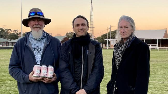 Graham Ward (left) and Robyn Rhodes are the grandchildren of Australian international no.10 Dave Ward. Alongside Illawarra football historian Travis Faulks at Balgownie’s Judy Masters Oval. Picture: Dylan Arvela