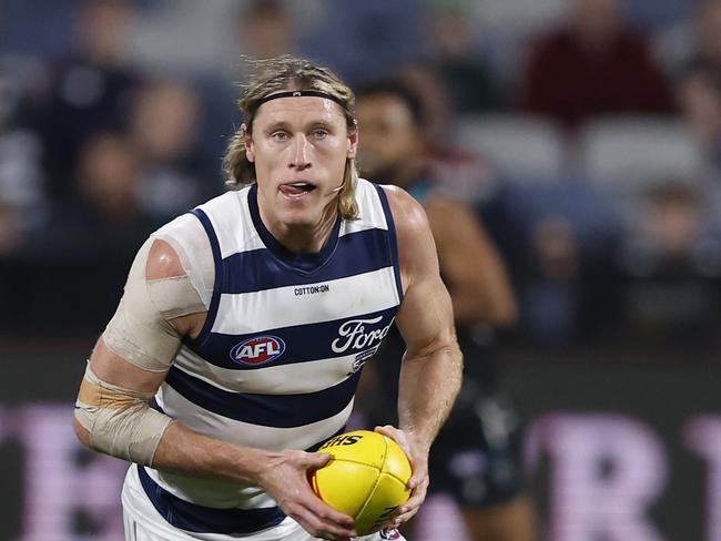 GEELONG, AUSTRALIA - MAY 10: Mark Blicavs of the Cats runs with the ball during the round nine AFL match between Geelong Cats and Port Adelaide Power at GMHBA Stadium, on May 10, 2024, in Geelong, Australia. (Photo by Darrian Traynor/Getty Images)