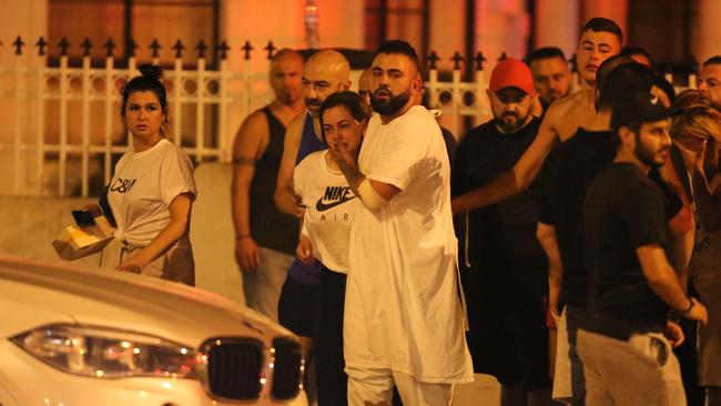 Maghnie’s son arrives at the scene dressed in a hospital gown. Picture: Wayne Taylor.