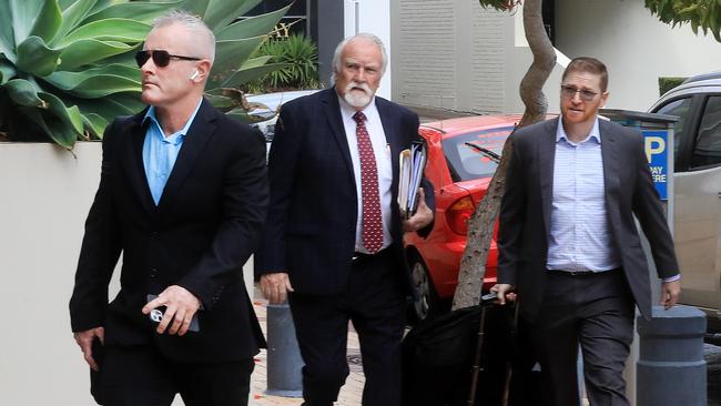 Jayden Moorea, formerly known as Dan Shearin, arrives at Southport court with his defence team for his committal hearing. Photo: Scott Powick.