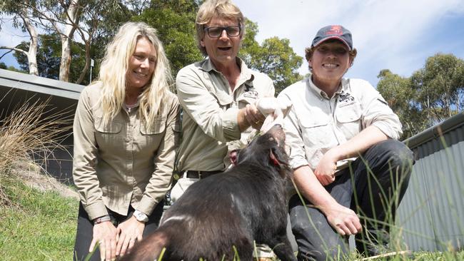 The new owners of East Coast Natureworld in Bicheno with head zoo keeper Chris Freeman. Picture: SUPPLIED