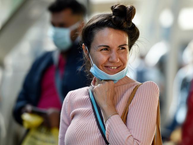 An Australian resident returning from India at Sydney Airport. Picture: AAP