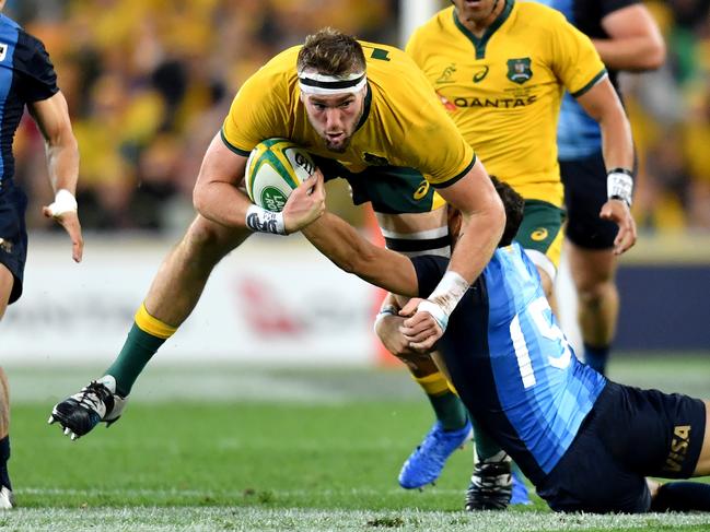 Izack Rodda (left) of the Wallabies takes the ball up. Picture: AAP Image/Darren England