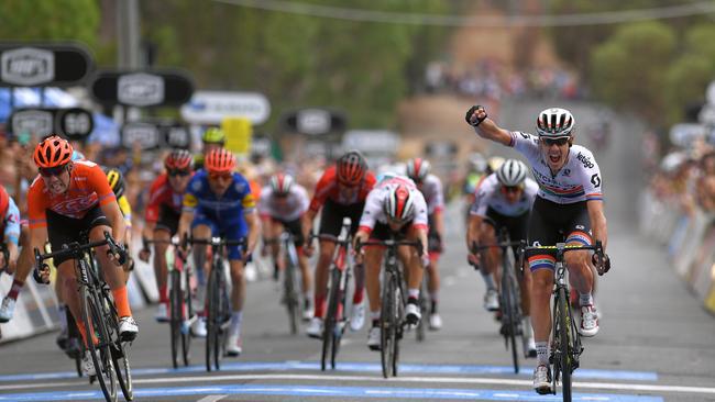 Daryl Impey of South Africa and Team Mitchelton-Scott edges out Patrick Bevin of New Zealand and CCC Team to the finish line at Campbelltown to score the win on Stage 4 of the 2019 Tour Down Under. Picture: Tim de Waele/Getty Images