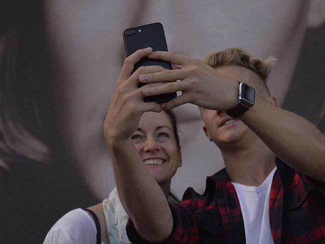 Fans arrive at the Adele concert in Sydney's ANZ Stadium. Photo Jeremy Piper