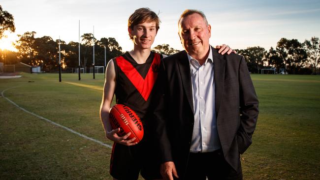 Rostrevor rising star Max Michalanney with his dad Jim, who played in four SANFL flag wins for Norwood. Picture Matt Turner.