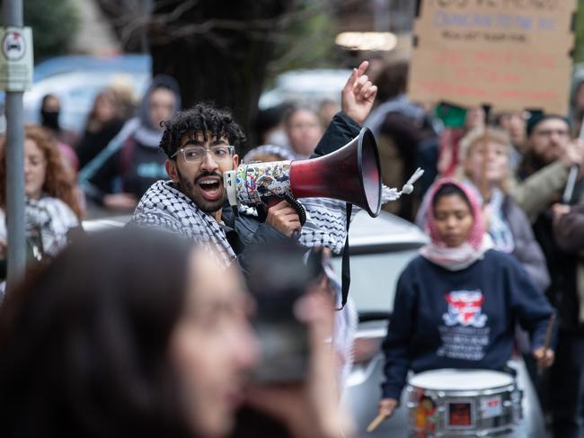 Scores of protesters join the rally. Picture: Jason Edwards