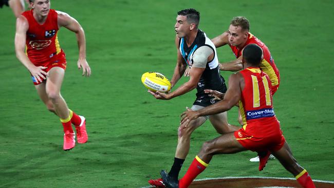 Tom Rockliff was among Port’s best in its win over Gold Coast on Saturday night and now is in two weeks of isolation at home. Picture: Jono Searle (Getty)