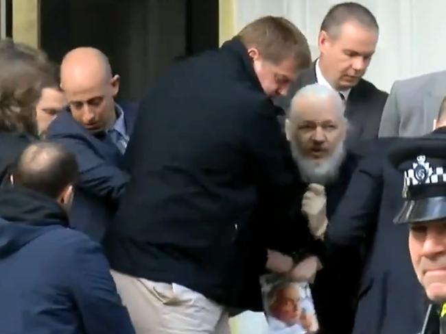 Wikileaks founder Julian Assange being removed from the Ecuadorian embassy Credit: Ruptly