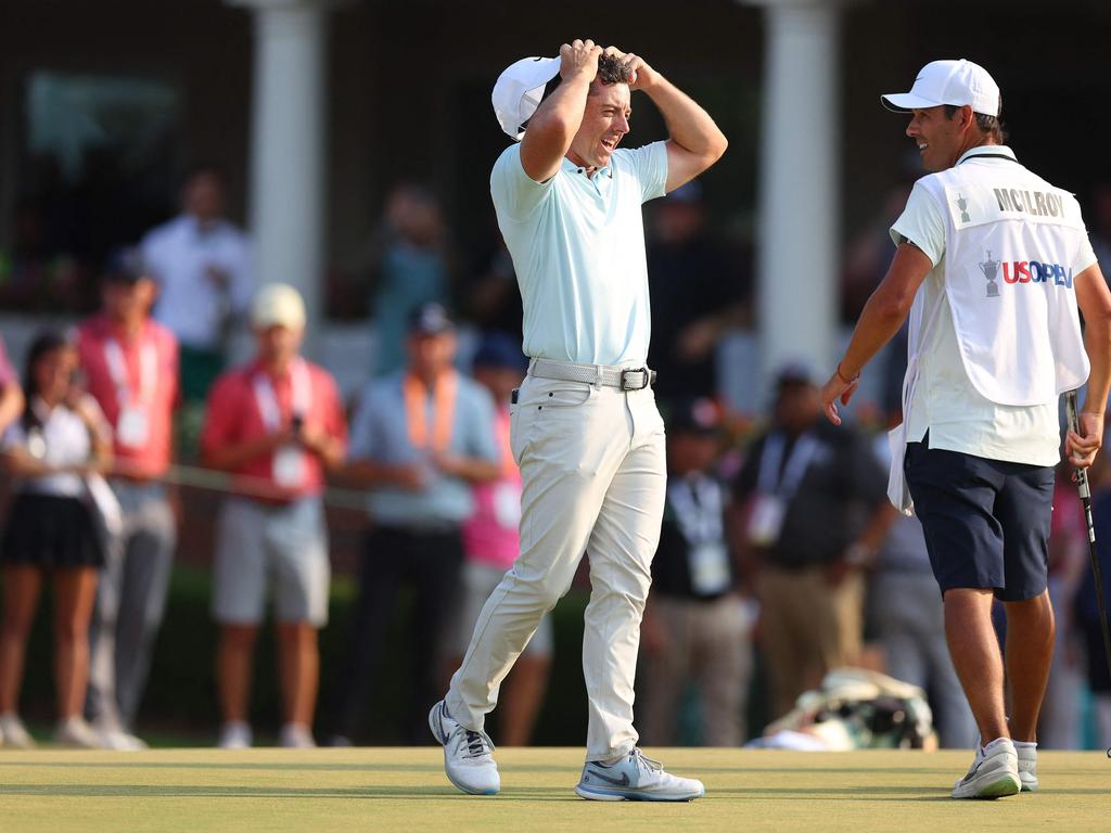McIlroy couldn’t believe he let another opportunity slip through his hands. (Photo by Andrew Redington//Getty Images via AFP)