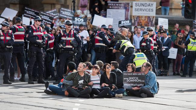 Animal rights activists in Melbourne on Monday. Picture: AAP