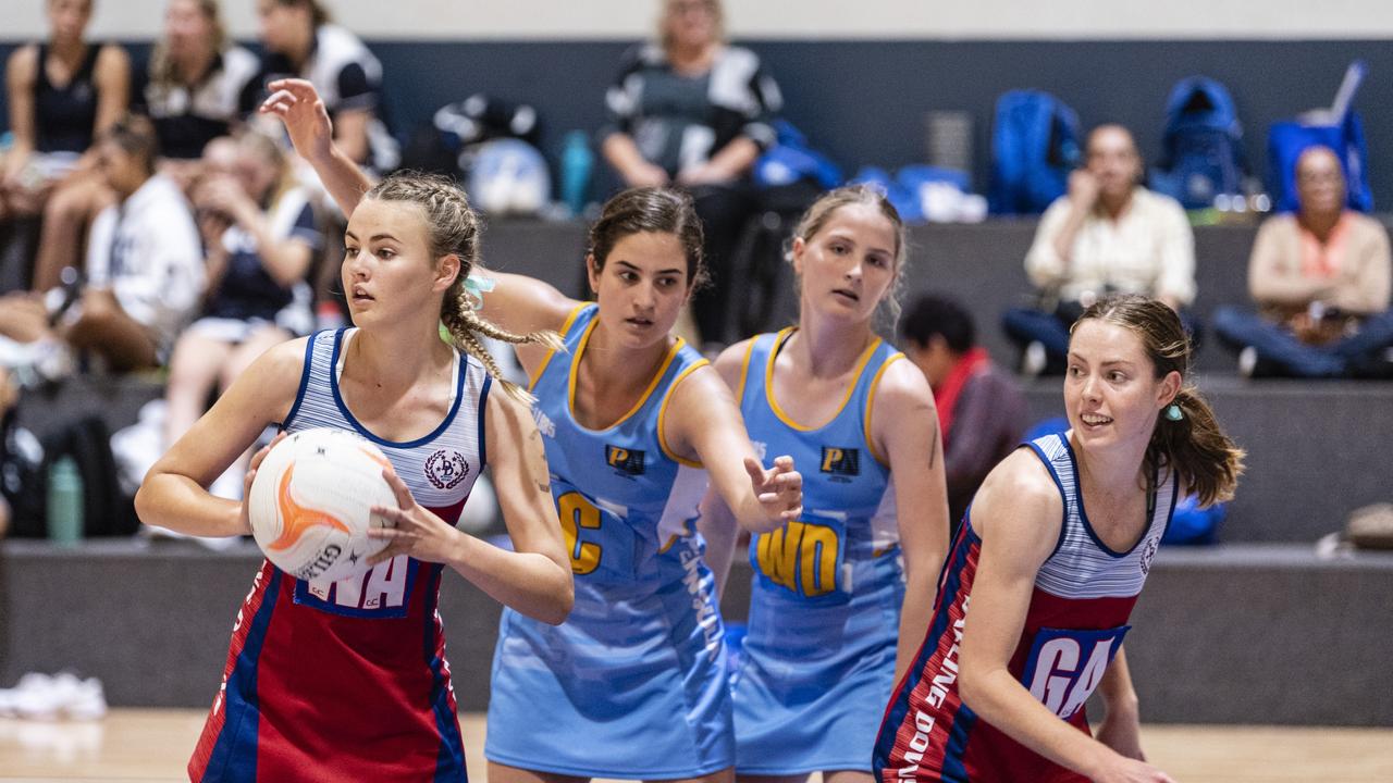 Krista Hughes has possession for Darling Downs against Peninsula in Queensland School Sport 16-19 Years Girls Netball Championships at Clive Berghofer Arena, St Mary's College, Friday, May 6, 2022. Picture: Kevin Farmer