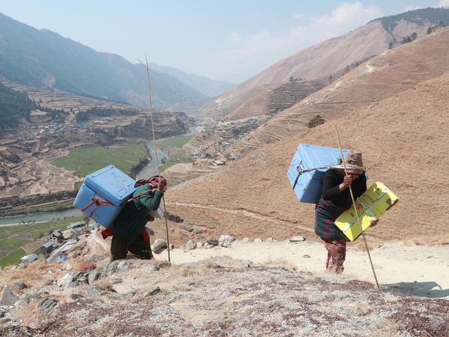 COVID-19 vaccines being transported on foot in the Jumla District in Nepal’s remote far-west region. Picture: UNICEF