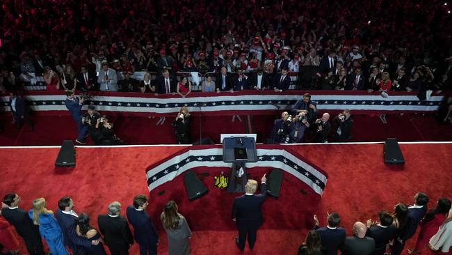 Donald Trump accepts applause at his election night watch party. Picture: AP Photo/Jeff Roberson