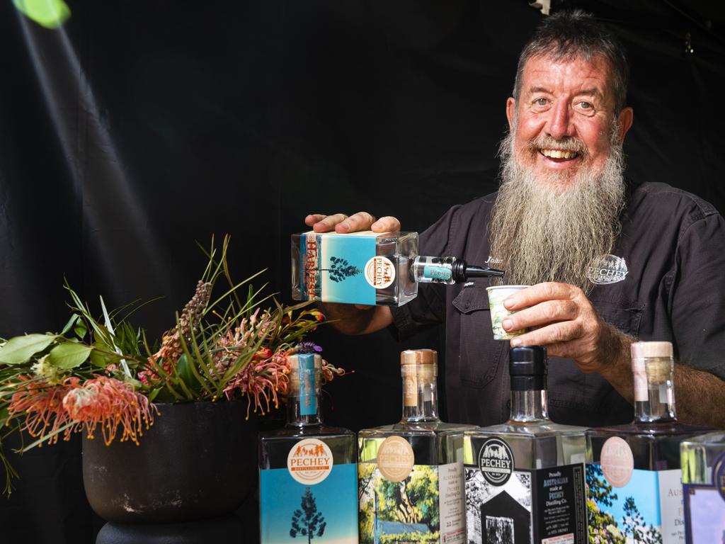 John O'Brien of Pechey Distilling Co prepares a sample of their summer release "Harvest" at the Locals 4 Locals summer edition on the lawn of Empire Theatres, Friday, February 18, 2022. Picture: Kevin Farmer