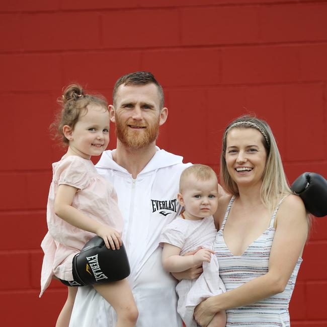 Dennis Hogan with partner Brideen and daughters Aria (left) and Lola. Picture: Annette Dew