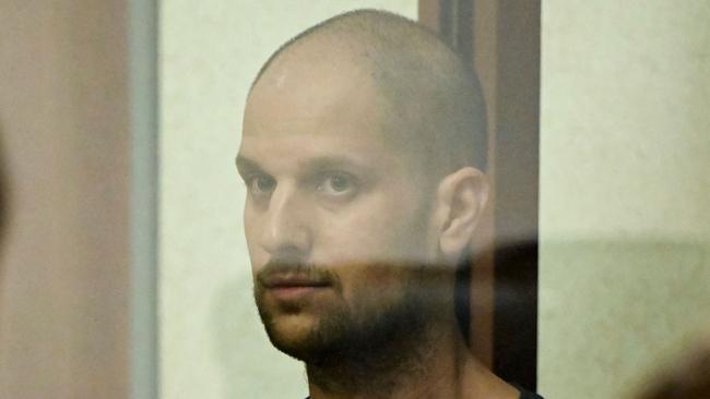 US journalist Evan Gershkovich, at the Sverdlovsk Regional Court in Yekaterinburg on Friday, has been sentenced to 16 years in prison on trumped-up spying charges. Picture: AFP