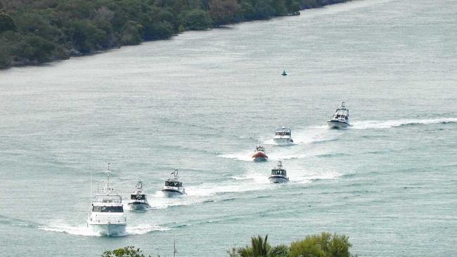 BE PREPARED: The Police vessel  Fearless  leads the Volunteer Marine Rescue vessels offshore to participate in the training search and rescue exercise.