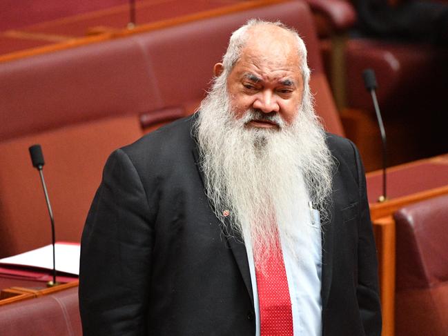 Labor Senator Pat Dodson reacts to Katter'€™s Australian Party Senator Fraser Anning first speech in the Senate chamber at Parliament House in Canberra, Wednesday, August 15, 2018. (AAP Image/Mick Tsikas) NO ARCHIVING