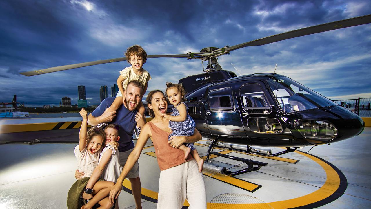 Ryan and Karley McAlpin with their children Hudson 7, Elliott 4, Reeve 2, Halle 1, promote new campaign by Destination Gold Coast where they will fly a lucky family from interstate for an all-expenses paid Glitter Strip holiday. Picture: Nigel Hallett