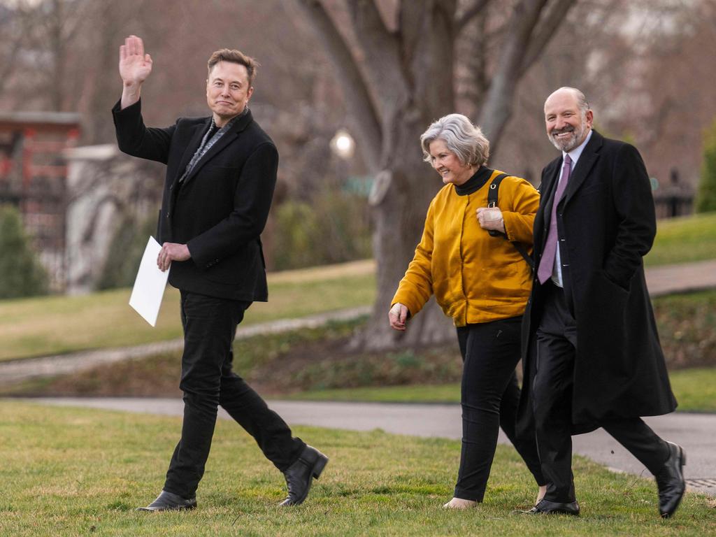Howard Lutnick (pictured right, with Elon Musk and White House Chief of Staff Susie Wiles) is in the firing line as a blame game erupts over the fallout anticipated by global tariffs. Picture: Jim Watson / AFP