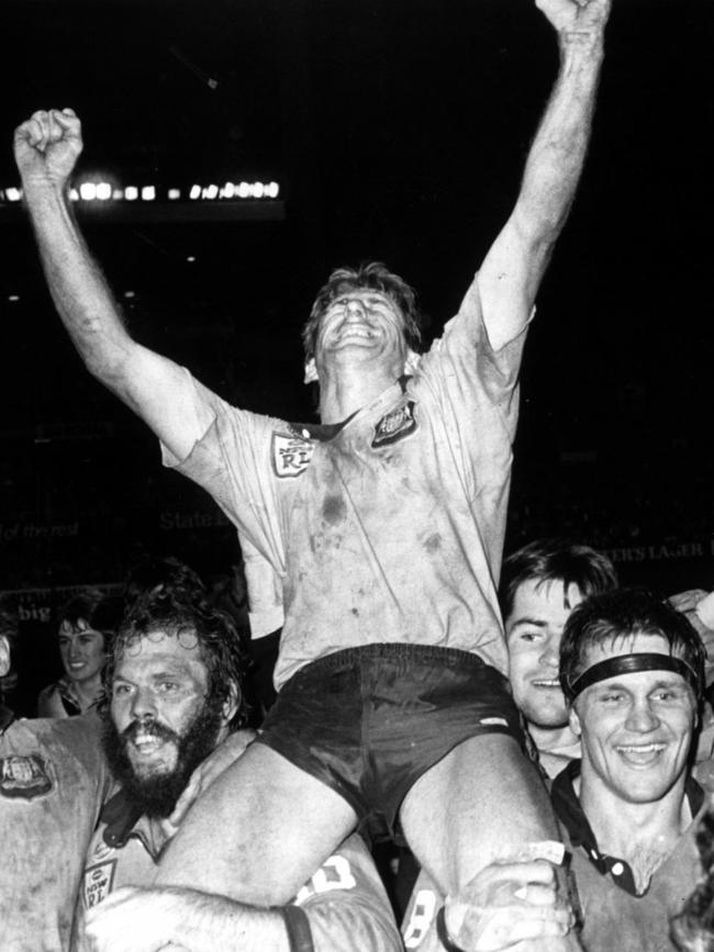 Steve Mortimer is was chaired off after sealing the Blues’ first-ever Origin series win.