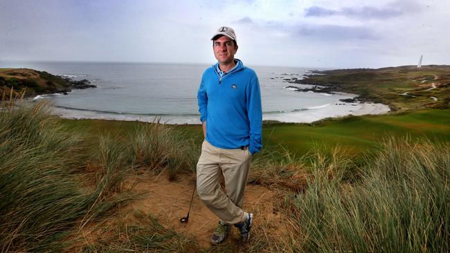 Cape Wickham golf course co-designer Darius Oliver over looking the scenic 18th hole. David Geraghty / The Australian