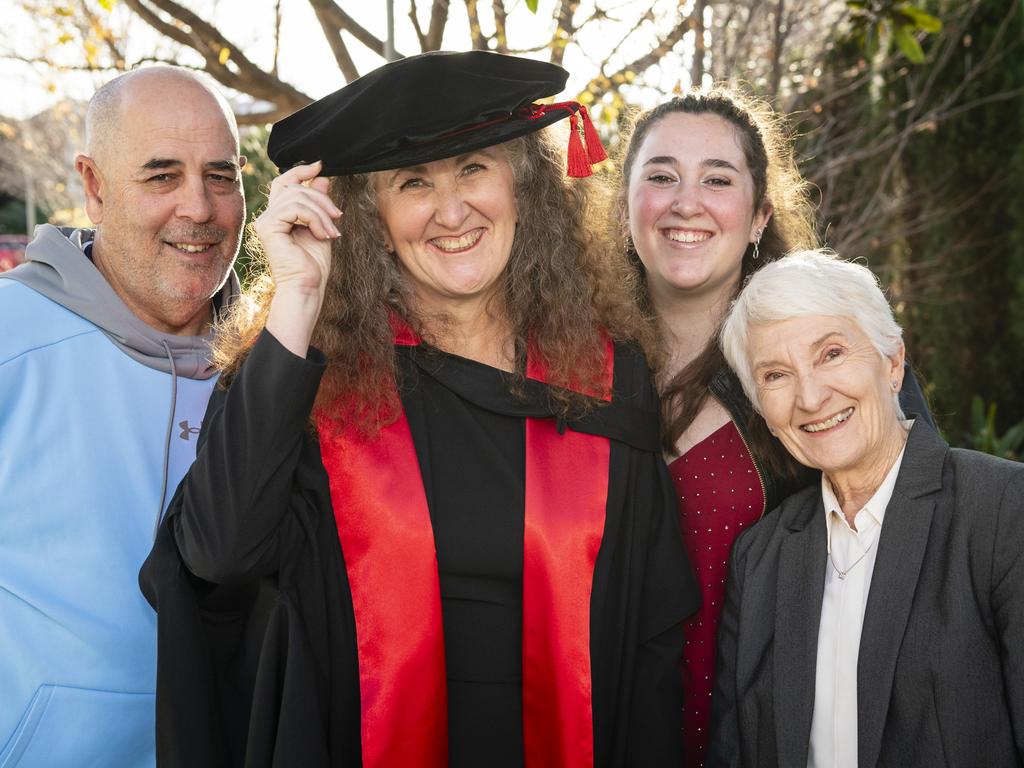 Doctor of Philosophy graduate Jane Shakespear-Druery with family (from left) Stephen Druery, Madelyn Druery and Laurel Shakespear at a UniSQ graduation ceremony at Empire Theatres, Wednesday, June 28, 2023. Picture: Kevin Farmer