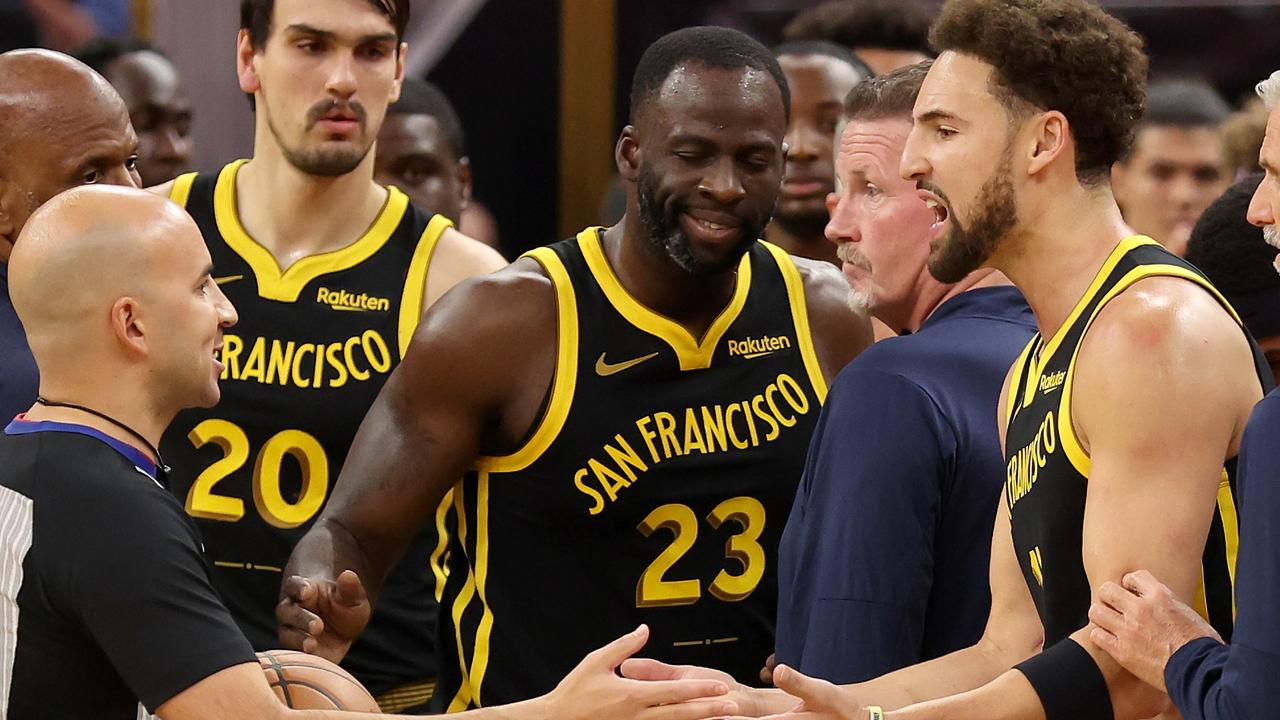 SAN FRANCISCO, CALIFORNIA - NOVEMBER 14: Klay Thompson #11 and Draymond Green #23 of the Golden State Warriors complain to the referee after getting into an altercation with the Minnesota Timberwolves at Chase Center on November 14, 2023 in San Francisco, California. NOTE TO USER: User expressly acknowledges and agrees that, by downloading and or using this photograph, User is consenting to the terms and conditions of the Getty Images License Agreement. (Photo by Ezra Shaw/Getty Images)