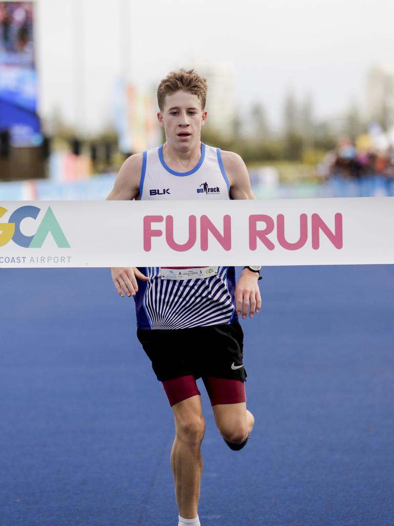 Lachlan Cornelius wins the five kilometre Gold Coast Airport Fun Run. Picture: Tim Marsden.