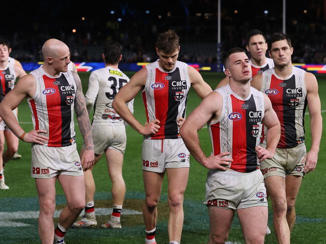 Jack Higgins leads the Saints off on Saturday night at Adelaide Oval. Picture: James Elsby/AFL Photos via Getty Images.