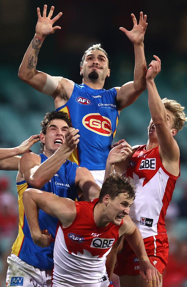 Izak Rankine soars over a pack.