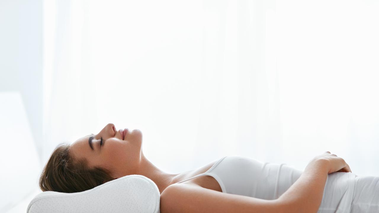 Anti-snore pillows are designed to improve head and neck alignment to help keep airways open, making them a simple yet effective tool for aid in reducing snoring. Picture: iStock: puhhha