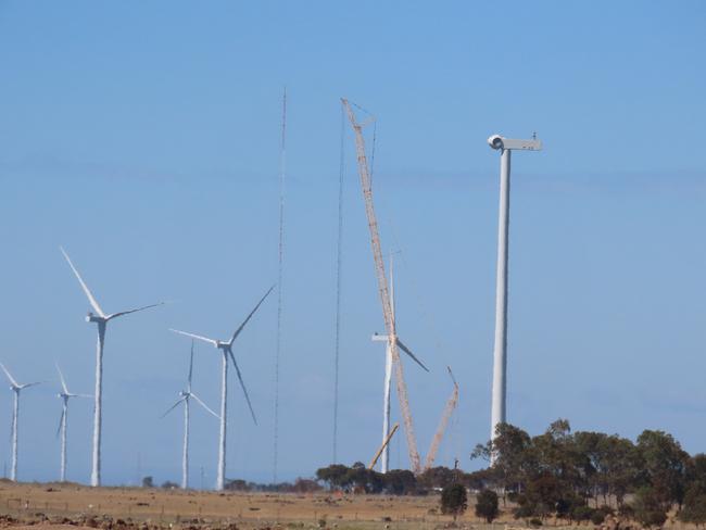 Police, paramedics, firefighters, and the SES have rushed to an industrial emergency in Rokewood understood to have involved an injury caused by a wind turbine. Picture: Timothy Cox.